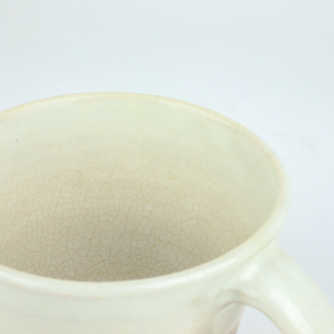 Fine crackle in a piece glazed in Nuka (rice-husk ash glaze), after years of use